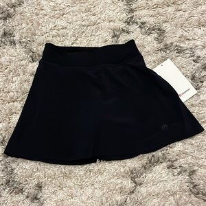 Lululemon lightweight high-rise tennis skirt. Size 2. New with tag. Black.